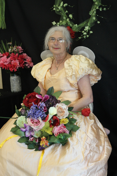Photo of Bess Sturgis with flowers